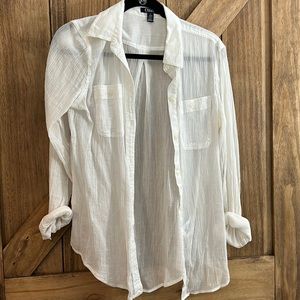 Lightweight, sheer white button-down blouse